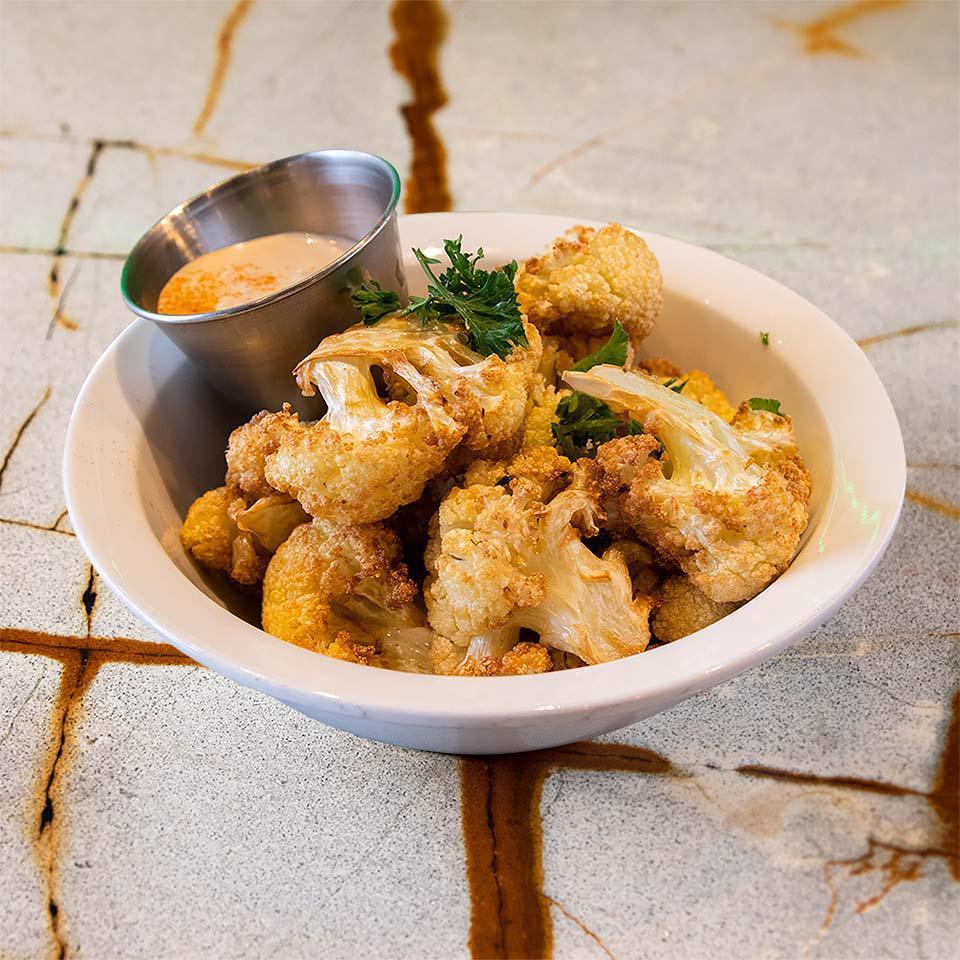 Arnabeet (V,GF) · Fried Cauliflower, drizzled with olive oil & lemon juice. Comes with one Pita Bread & Tahini Sauce. 