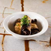 Batenjan (GF)  · Eggplant stuffed with parsley and feta cheese drizzled with olive oil. 