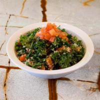 Tabouli (V) · Hand chopped curly parsley, tomatoes, & onions mixed with salt, pepper, lemon juice & extra ...