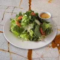 Green Salad (V,GF) · Romaine lettuce with tomato, cucumber, parsley, and homemade house dressing. 
