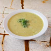 Lentil Soup (V,GF) · Our traditional soup with red lentils, green peas, rice & potatoes steamed with veggie broth...