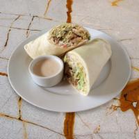 Falafel Sandwich (V) · Original hummus, our exclusive falafel made from scratch, served on our house pita bread, to...