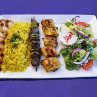 Chicken and Souvlaki Kabob · Delicious boneless chicken tender and marinated skewer of steak charbroiled to perfection wi...