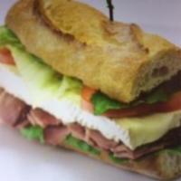 20. Smart Duck Sandwich · Smoked breast of duck, Brie, and cornichons.