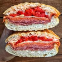 The Sanzese Panini · Hot cappi, pepperoni, soppressata, provolone with hot or sweet peppers. 