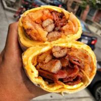 Breakfast Burrito · Sausage, bacon, egg and cheese with potatoes on wrap. 