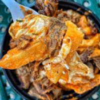 Knockout Fries · Garlic french fries, steak, vodka sauce and melted mozzarella. 