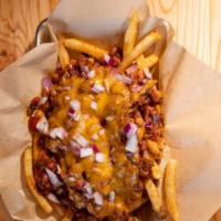Chili Cheese Fries · Our signature seasoned fries covered with smokehouse chili. Topped with cheese and red onion.