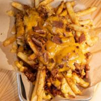 Messy Mac and Cheese · Our signature seasoned fries topped with mac and cheese and your choice of smoked meat, BBQ ...