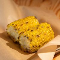 Grilled Corn on the Cob · Yellow corn cobettes grilled with chili butter, salt and pepper.