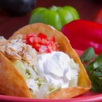 Taco Salad · A large deep fried crispy flour shell filled with your choice of shredded seasoned chicken o...