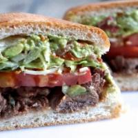 Torta · A large and delicious traditional Mexican sandwich, filled with lettuce, onions, tomatoes, a...