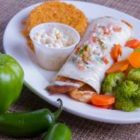 Grilled FIesta Burrito · An extra large burrito stuffed with grilled steak or chicken, grilled onions, peppers and pi...