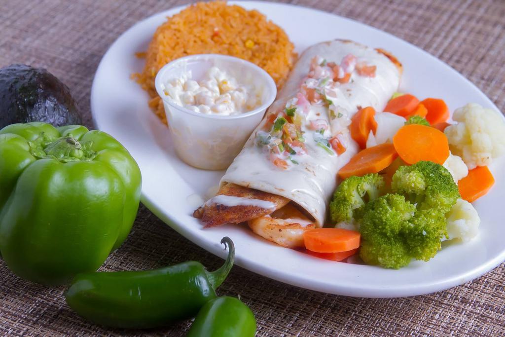 Grilled FIesta Burrito · An extra large burrito stuffed with grilled steak or chicken, grilled onions, peppers and pico de gallo, covered with a cheese and burrito sauces. Served with rice, beans, lettuce, tomatoes and sour cream.