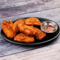 Red Chili Poppers · Red chili pepper filled with cream cheese, breaded and fried, served with a sweet red chili ...