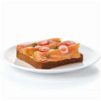 Salmon Toast · Brioche Toast, Smoked Salmon, Cucumber, Cream Chive, Caper, Cherry Tomato, Red Onions