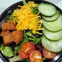 Chef Salad · Fresh mixed greens, cucumber, tomatoes, cheese and croutons.