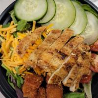 Flame Grilled Chicken Breast Salad · Fresh salad with mixed greens, tomato, cucumber, croutons and flamed grilled chicken breast.