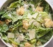 Caesar Salad · Crisp romaine lettuce tossed with creamy Tuscan Caesar dressing, garlic croutons. Add protein for an additional charge.