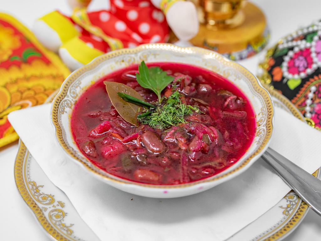 Small bowl of Borsht · Vitamin bomb! Vegan! Traditional soup of beets, cabbage, potato, tomato, mushrooms, onions, and beans. Great in the winter, but perfect year round.


