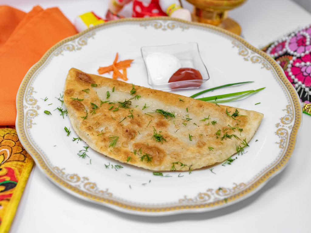 Cheburek · Slavic empanada with turkey.

