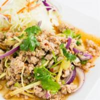 S6. Ground Chicken Salad · Shredded ginger, onion, roasted peanut, cilantro, house special lime sauce. Gluten free, nut...