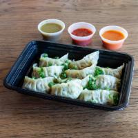 Steamed Veggie Momo · filling:cabbage,onion,broccoli,potato,tofu,carrot,beans,peas,cilantro,salt,spices.
wrap:wate...