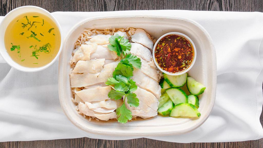The Marina · All breast, skinless, poached, organic Mary's chicken over fragrant organic brown rice, garnished with cucumber and cilantro. Served with a fresh chili, ginger, garlic and soybean sauce and a side of chicken broth