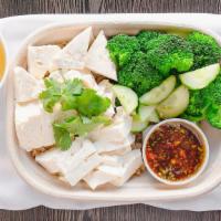 The Vegetarian · Organic tofu, brown rice, and seasonal veggies garnished with cucumber and cilantro. Served ...