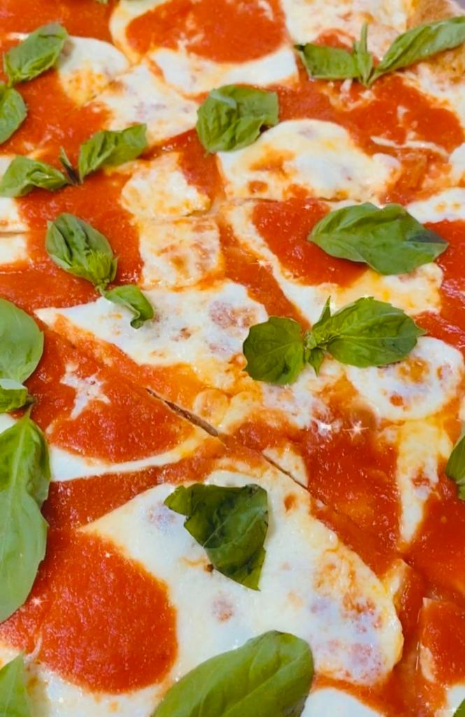 Margherita Pizza · Fresh mozzarella, plum tomatoes, garlic and basil, and fresh basil  on the top. Pair wine with: Pinot Grigio, Sangiovese (Chianti), Rose