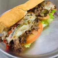 Cheesesteak California · Lettuce, tomatoes, onions and mayo.