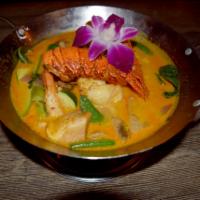 Fire Wok · Prawn, lobster tail, sea scallops, lemongrass, Thai curry.