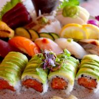 Sushi and Sashimi Dinner · Assortment of 5 pieces sushi and 12 pieces of sashimi and a tuna roll.