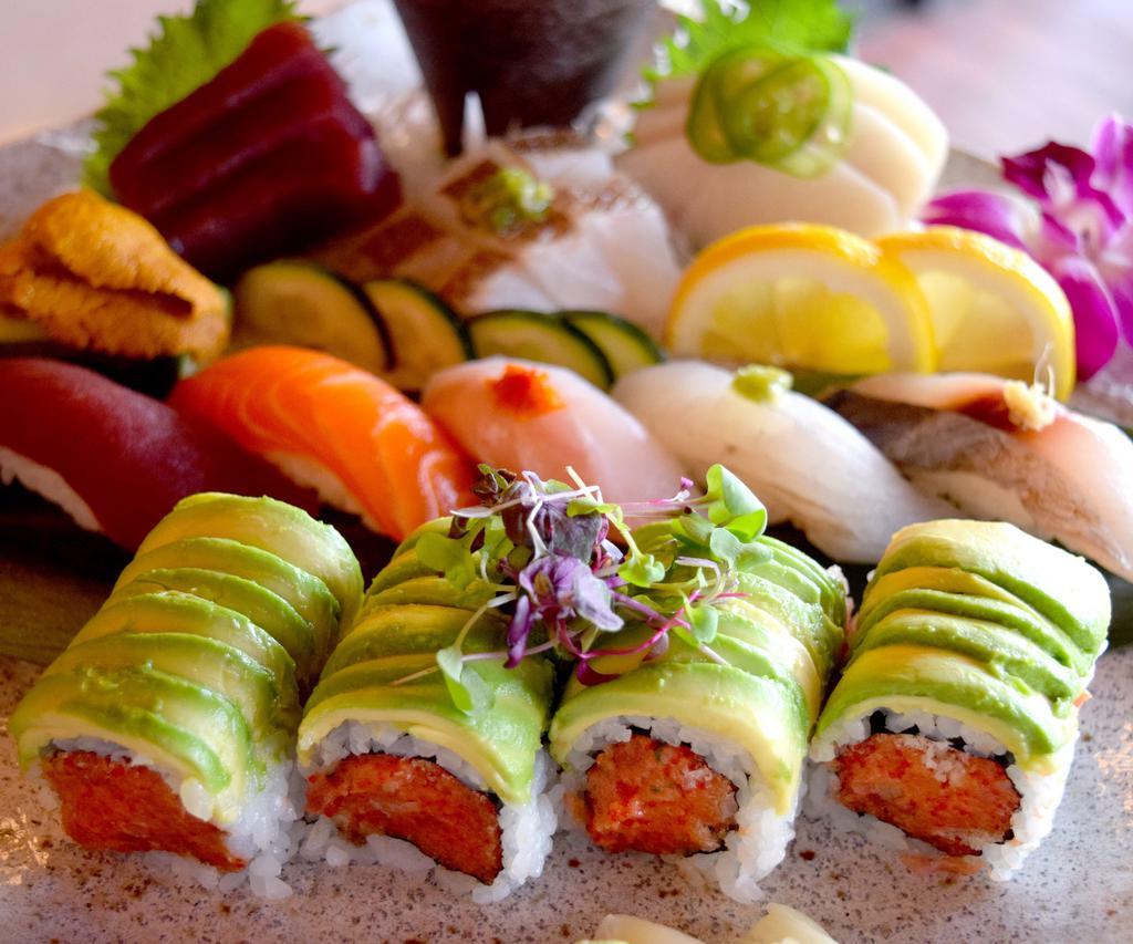 Sushi and Sashimi Dinner · Assortment of 5 pieces sushi and 12 pieces of sashimi and a tuna roll.