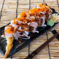 River Cat Roll · Shrimp tempura, spicy tuna, white tuna, seared tuna, crab mix, and masago. Spicy.