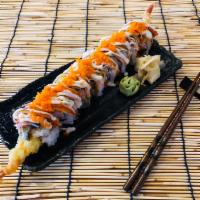 Tiger Roll · Shrimp tempura, crab mix, unagi, shredded Kani, avocado, masago, unagi sauce and white sauce.
