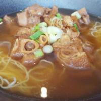 N14. Braised Pork Hock Noodle Soup · Savory light broth with noodles. 