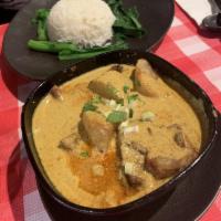 C16. Curry Beef Brisket over Rice · 