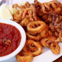 Crispy Calamari · Lightly breaded and flash fried, served with spicy-ish tomato sauce.