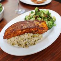 Roasted Salmon · Oven roasted spice rubbed Salmon served over seasonal risotto with a side of roasted broccoli