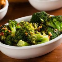 Roasted Broccoli · Lightly roasted, seasoned with chili garlic oil. Vegan and gluten free.