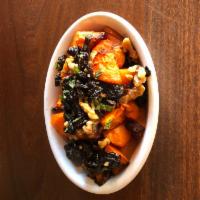 Carrots with Prunes and Walnuts · Honey roasted carrots, topped with walnuts, prunes and mint. Gluten free.