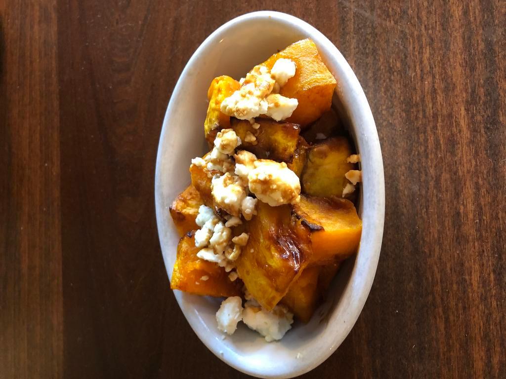 Roasted Butternut Squash · Roasted butternut squash topped with ricotta salata and finished with a drizzle of saba. Gluten free.
