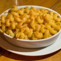 Creamy Mac & Cheese · Our creamy cheddar mac and cheese topped with toasted breadcrumbs