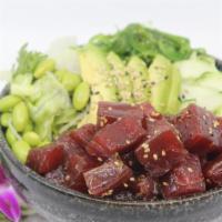 Poké Ahi Tuna Poké Bowl · Choice of protein with rice base, pickled cucumber, avocado, edamame, green leaf lettuce and...