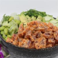 Spicy Ahi Tuna Poké Bowl · Choice of protein with rice base, pickled cucumber, avocado, edamame, green leaf lettuce and...
