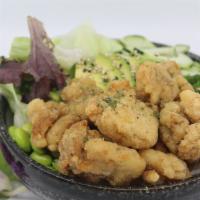 Chicken Karaage Poké Bowl · Choice of protein with rice base, pickled cucumber, avocado, edamame, green leaf lettuce and...