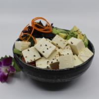 Tofu (Vegetarian) Poke Bowl · Choice of protein with rice base, pickled cucumber, avocado, edamame, green leaf lettuce and...