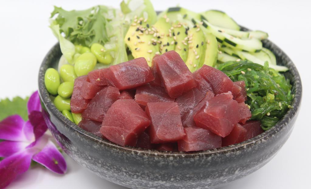 Reg. Ahi Tuna  Salad Bowl · Choice of protein with salad base, pickled cucumber, avocado, carrot, red cabbage, edamame, sweet corn and seaweed salad. Contains raw fish.