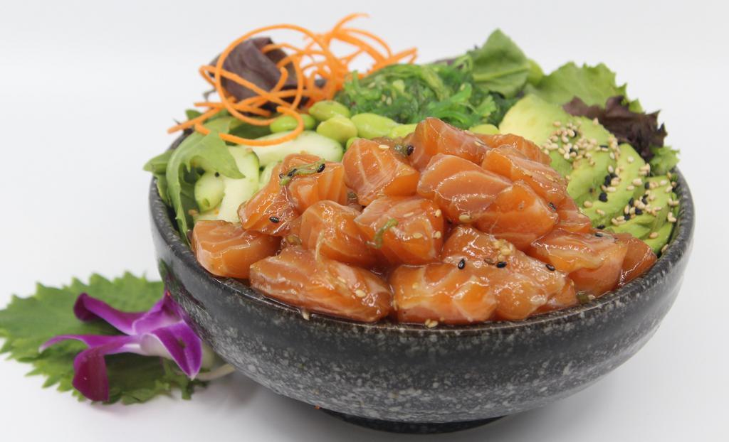 Poké Salmon Salad Bowl · Choice of protein with salad base, pickled cucumber, avocado, carrot, red cabbage, edamame, sweet corn and seaweed salad.  Contains raw fish.
